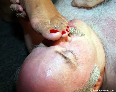 Woman Dominates Man with Her Feet Before Sex – photo 14 of 15