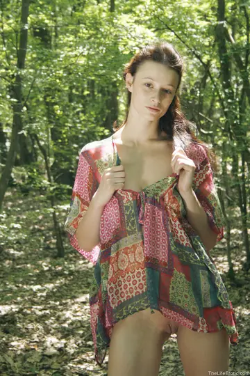 Thick Brunette Undresses and Spreads Her Ass in the Forest