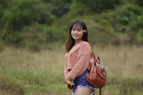 Petite Asian Babe in Shorts and Glasses Poses Outdoors – photo 10 of 21