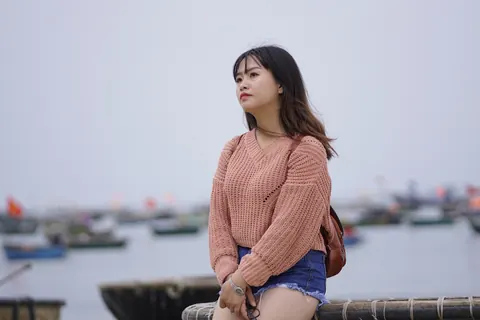 Petite Asian Babe in Shorts and Glasses Poses Outdoors – photo 8 of 21