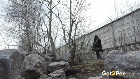 Lara Fox: Skinny Czech Brunette Squats on Boulders to Piss Outdoors – photo 15 of 15