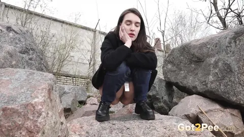 Lara Fox: Skinny Czech Brunette Squats on Boulders to Piss Outdoors – photo 2 of 15