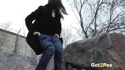 Lara Fox: Skinny Czech Brunette Squats on Boulders to Piss Outdoors – photo 14 of 15
