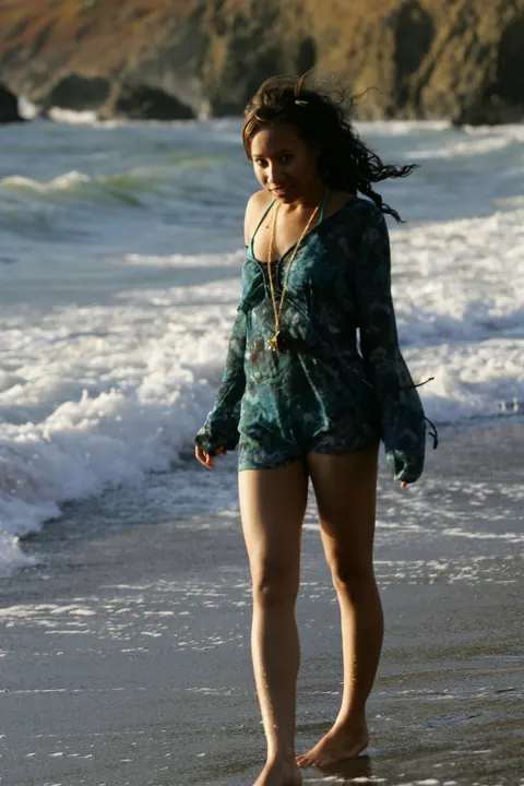 Woman in a Bikini Walks on a Sandy Beach – photo 3 of 21
