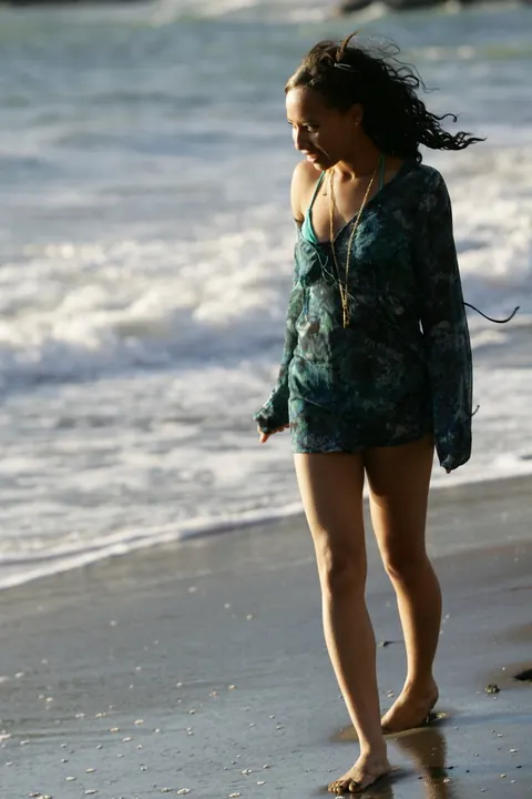Woman in a Bikini Walks on a Sandy Beach – photo 14 of 21