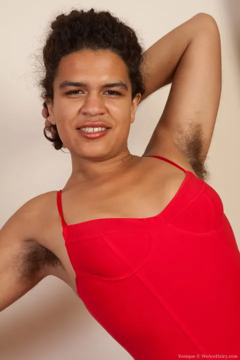 Yonique: Ebony Babe in Fishnet Stockings Shows Hairy Pits and Bush – photo 1 of 16