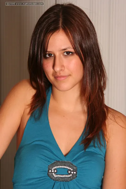 Brunette in a Skirt Strips on the Sofa and Spreads Her Trimmed Pussy – photo 1 of 16