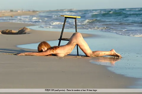 Birgid: Slim European Redhead Poses Nude on a Chair at the Beach – photo 10 of 16