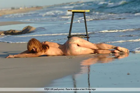 Birgid: Slim European Redhead Poses Nude on a Chair at the Beach – photo 9 of 16