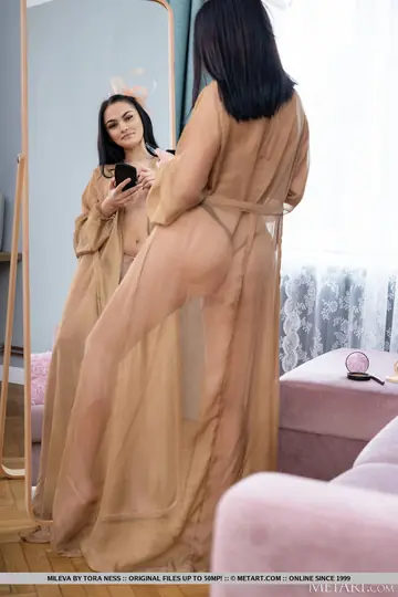 Brunette Fixes Her Makeup Then Spreads Her Shaved Pussy