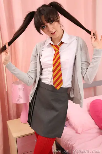 Thick Brunette in Uniform Skirt and Pantyhose Exposes Her Body