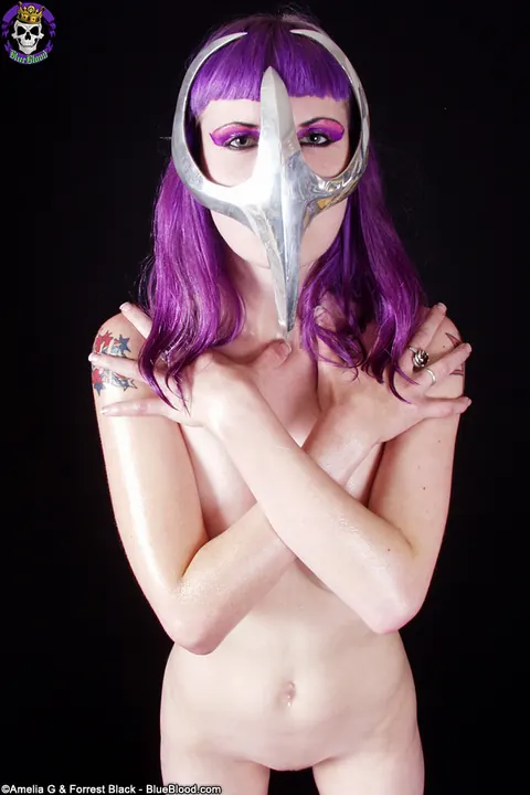 Szandora: Redhead MILF Poses in Chrome Mask and Oil – photo 7 of 15