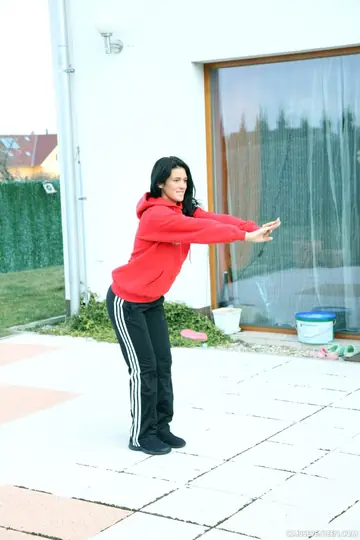 Petite European Brunette Undresses and Spreads Outdoors