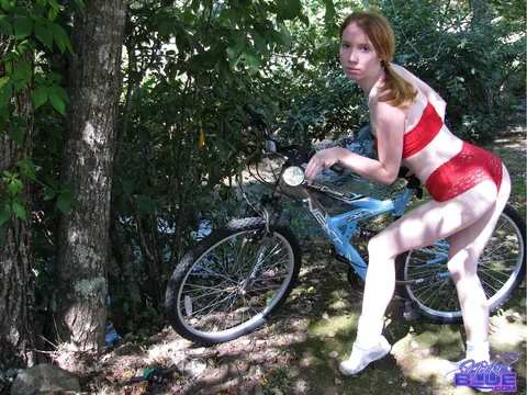 Nicki Blue: PAWG Redhead in a Bikini and Shorts Poses on a Bicycle Outdoors – photo 6 of 15