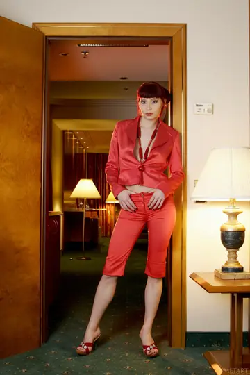 Tall Redhead Spreads Her Shaved Pussy in High Heels