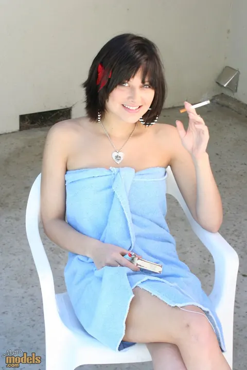 Ellie Idol: Brunette MILF Drops Her Robe and Smokes Naked Outdoors – photo 1 of 16