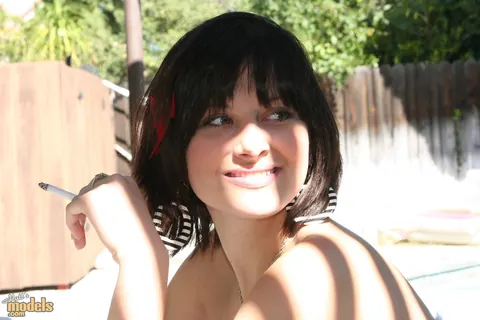 Ellie Idol: Brunette MILF Drops Her Robe and Smokes Naked Outdoors – photo 7 of 16