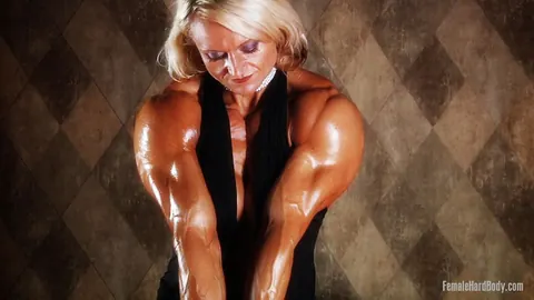 Brigita Brezovac: Blonde MILF Poses in a Plunging Black Dress – photo 11 of 14