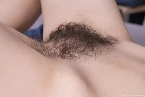 Blonde PAWG in Shorts Spreads Her Hairy Pussy on the Bed – photo 16 of 21