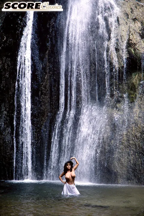 Stacy Owen: Thick Brunette MILF Bares Her Big Tits by Waterfall – photo 7 of 16
