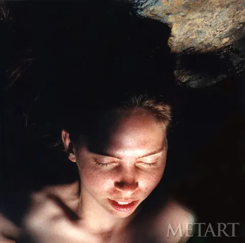 Woman Poses Nude for Intimate Photo Session – photo 2 of 16