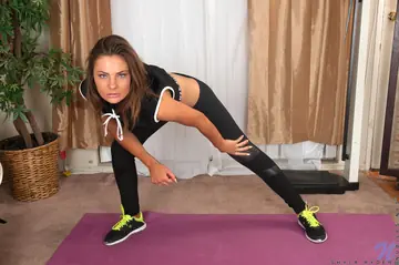 Slim Brunette Peels Down Her Yoga Pants to Flaunt Her Big Ass