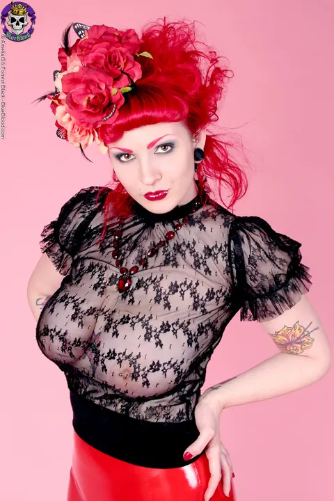 Redhead MILF Poses in a Sheer Top and Latex Skirt – photo 9 of 18