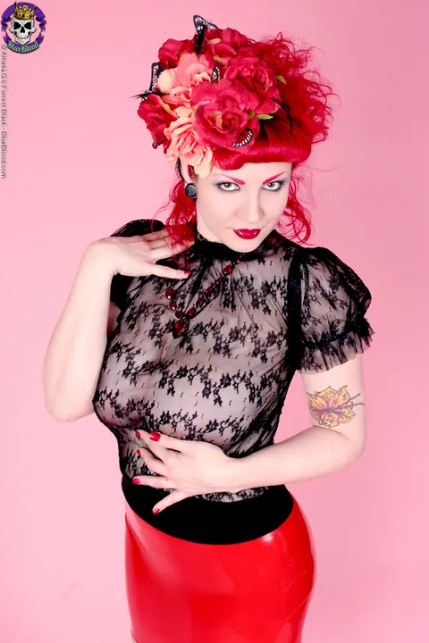 Redhead MILF Poses in a Sheer Top and Latex Skirt – photo 6 of 18