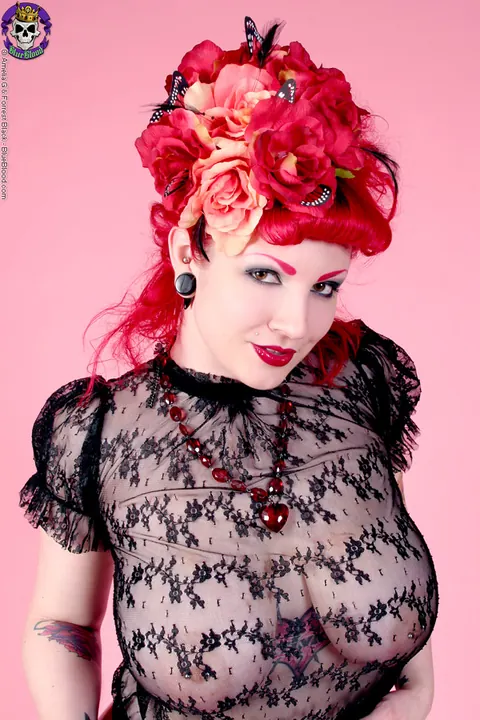 Redhead MILF Poses in a Sheer Top and Latex Skirt – photo 17 of 18