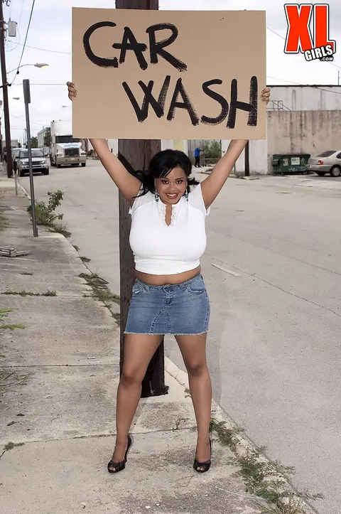 Sunny Dee: Thick Ebony MILF Shows Off Her Giant Natural Tits at the Car Wash – photo 1 of 16
