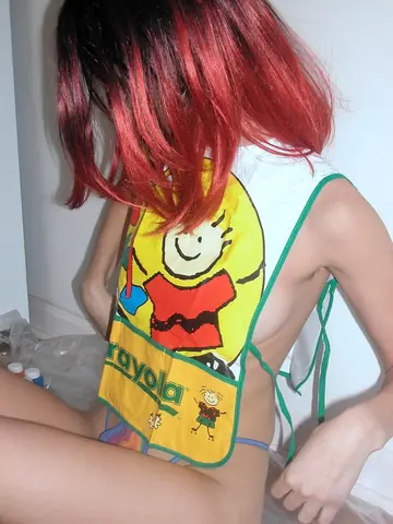 Latina Amateur Redhead Poses Nude with Paint on Her Body