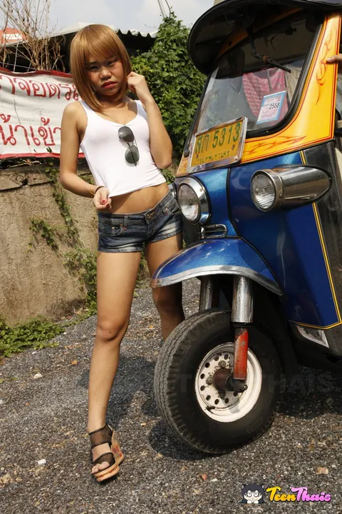 Asian Women in Heels and Boots Play with a Toy – photo 2 of 20