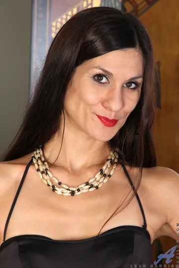 Skinny Mature Brunette Strips Out of Her Dress and Fingers Her Pussy