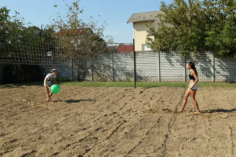 Gina Gerson: Two Slim Russian Lesbians Play with Asses Outdoors in Shorts After Volleyball – photo 1 of 21