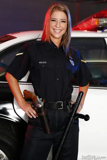 Redhead Strips Out of Her Police Uniform and Spreads Her Legs
