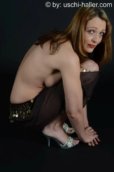 Redhead MILF Poses in High Heels and Flaunts Her Big Ass – photo 13 of 15