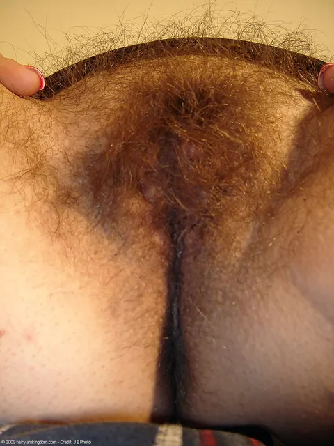 Curvy Blonde Undresses and Spreads Her Hairy Pussy – photo 12 of 20