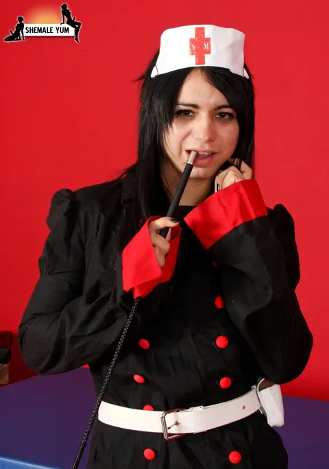 Trans Woman Poses in Costume Uniform Showing Her Body – photo 2 of 16