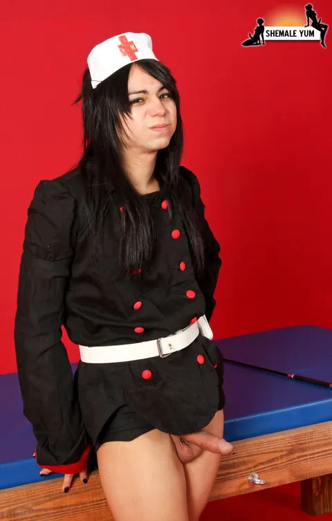 Trans Woman Poses in Costume Uniform Showing Her Body – photo 5 of 16