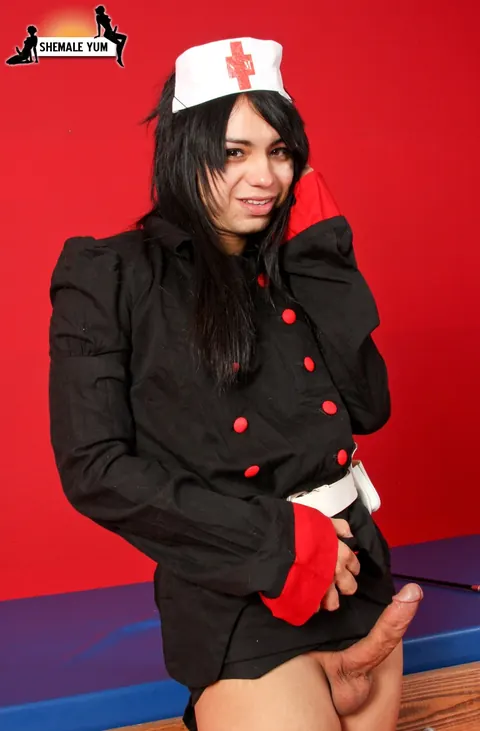 Trans Woman Poses in Costume Uniform Showing Her Body – photo 4 of 16