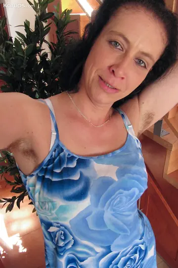 Hairy MILF in Lingerie Takes Selfies Spreading Her Pussy