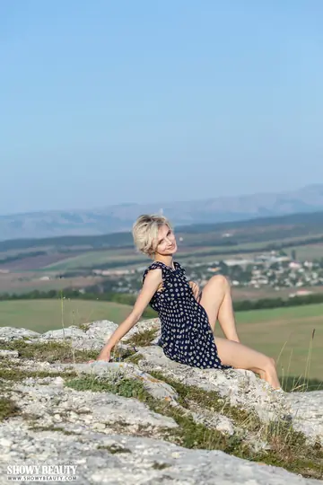 Slim Blonde Spreads Her Hairy Pussy in a Skirt