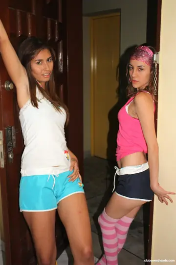 Two Slim Latina Brunettes in Shorts and Socks Lick and Finger