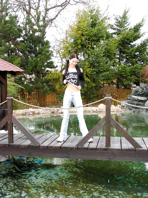 Klea Dark: Slim Brunette Strips Out of Her Skirt and Jeans Outside – photo 4 of 16