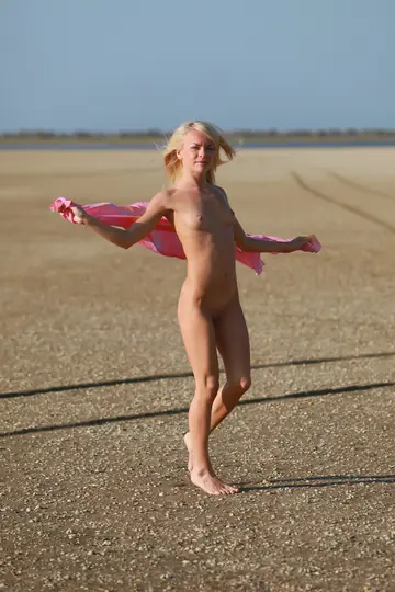 Skinny Blonde Spreads Her Pussy on the Beach