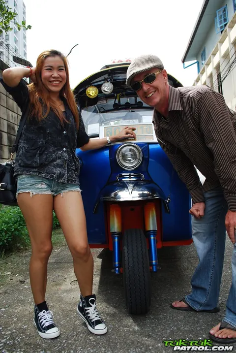 Noy: Thai Brunette Kisses Her Driver in a Mini Taxi Outdoors – photo 9 of 17