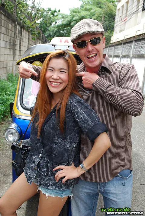 Noy: Thai Brunette Kisses Her Driver in a Mini Taxi Outdoors – photo 8 of 17