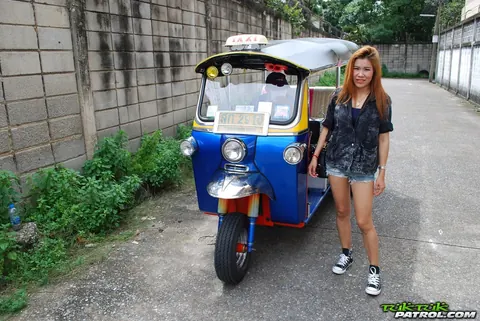 Noy: Thai Brunette Kisses Her Driver in a Mini Taxi Outdoors – photo 1 of 17