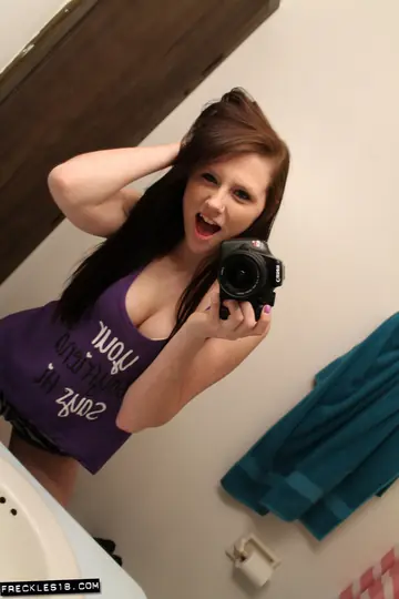 Busty Brunette Takes Mirror Selfies in Lingerie and Shorts