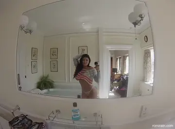Romi Rain – Brunette MILF with Big Tits Strips and Shows Her Curves in the Bathroom